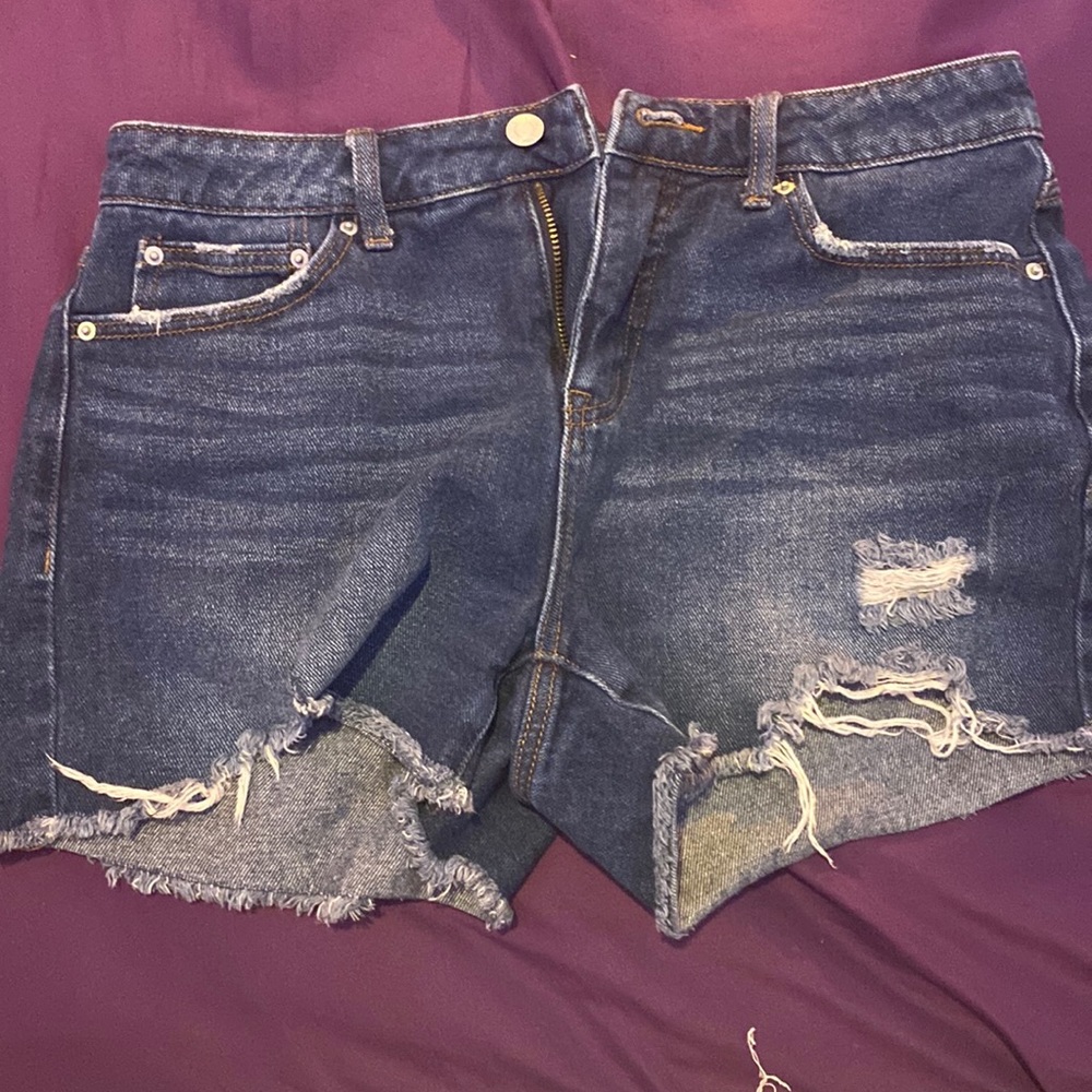 Time and True, high rise ripped blue jean shorts.